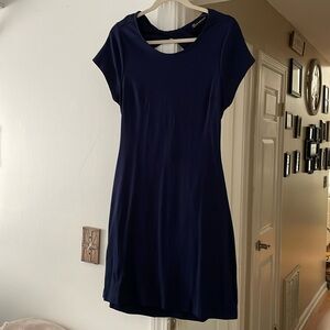 Woman’s navy blue dress